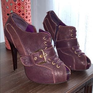 Sexy zip-up ankle boots with buckle detailing